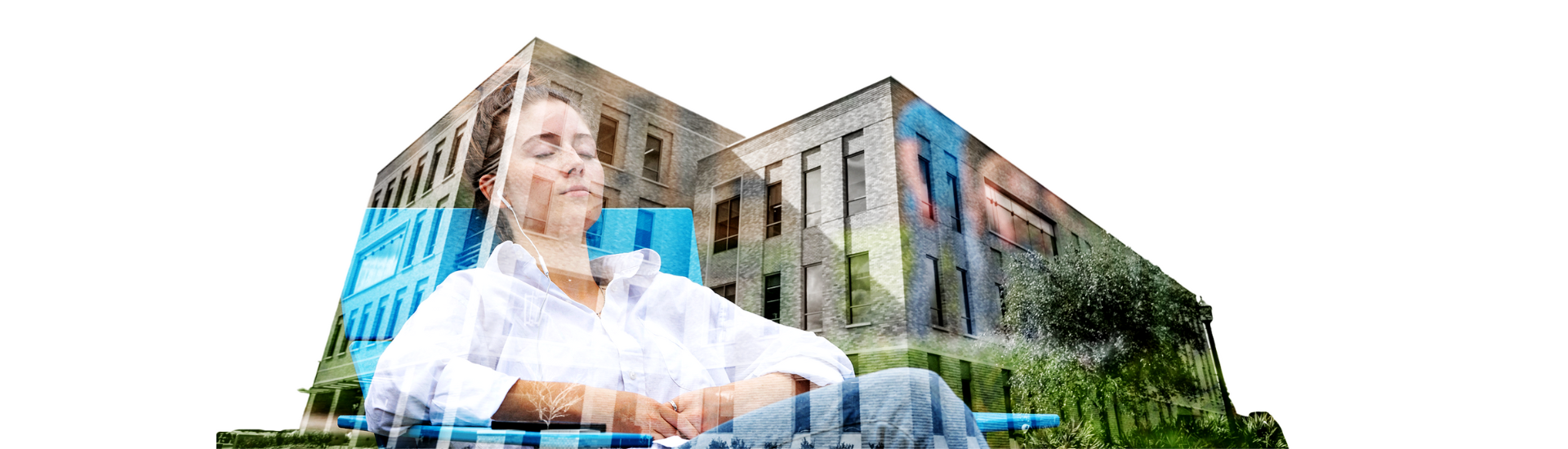 A student relaxing on a sunny day with her eyes close, listening to music with headphones, visible within the silhouette of the Student Services Building.